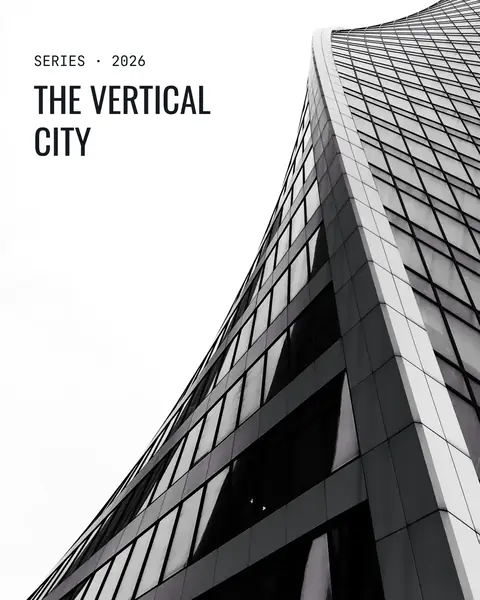 A dark glass facade curving against a white sky, with the kicker “Series · 2026” above the title “The Vertical City” in the empty white area