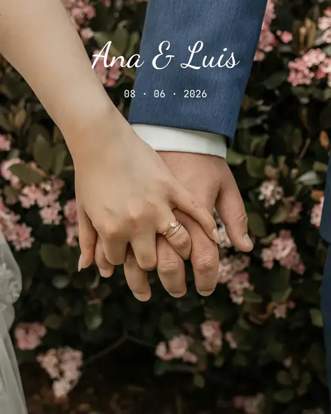 Two hands with wedding rings resting on blossoms, with “Ana & Luis” in a script face and the date beneath